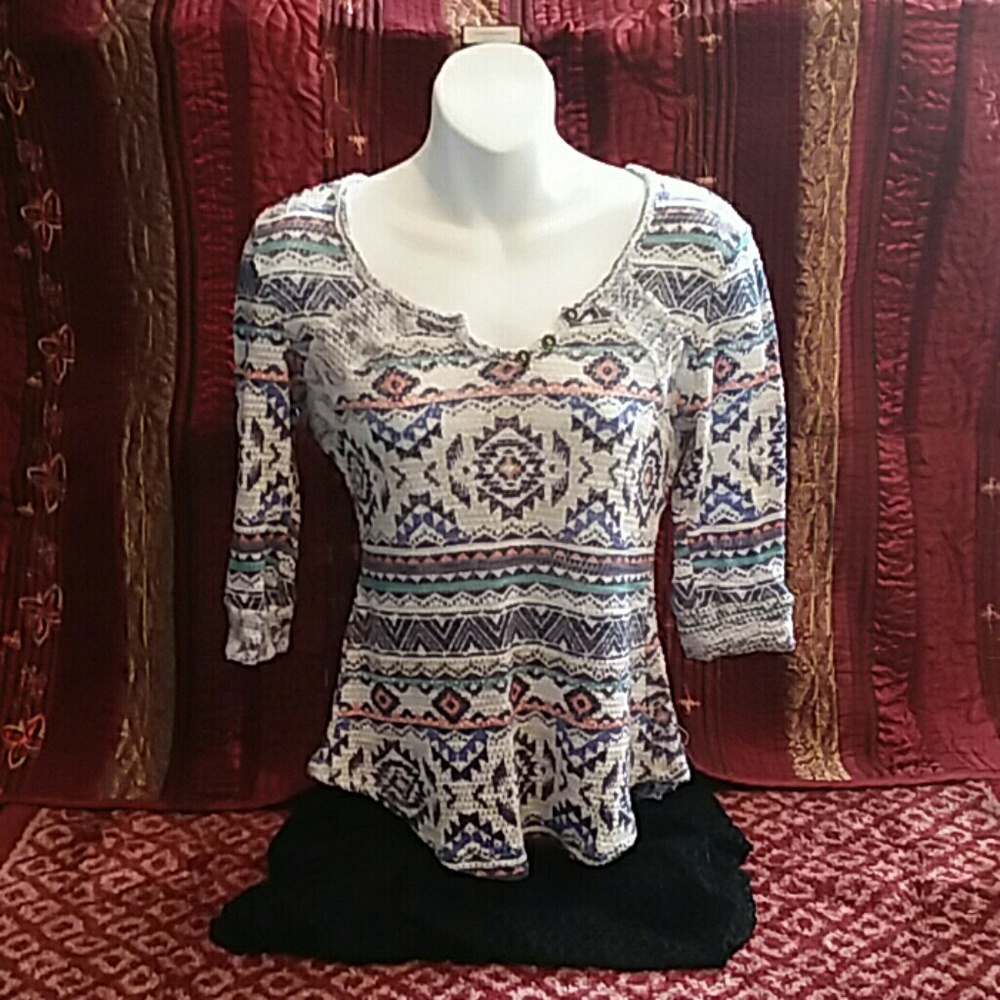 Tribal inspired half sleeved shirt.